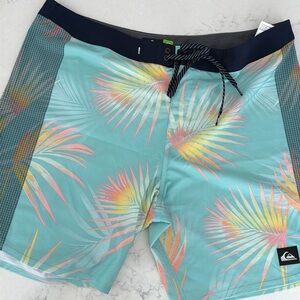Quicksilver Men’s board shorts, size 38, small mark on back pocket as shown